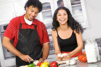 young couple cooking