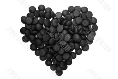 Heart made with black stones