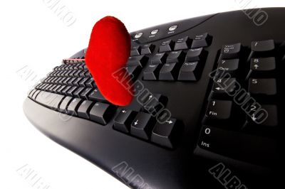 Computer keyboard and a heart isolated