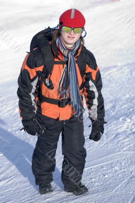 Man with Backpack in Winter Mountains on Snow