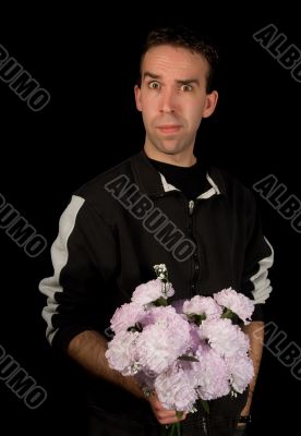Man Holding Flowers Isolated on Black