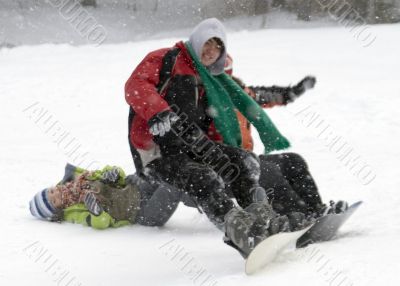 Group of sports teenagers snowborders