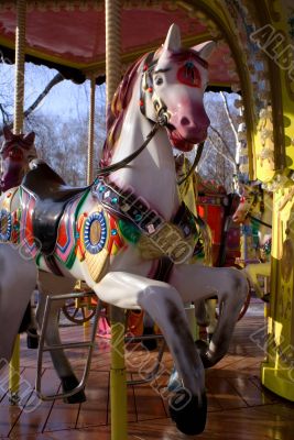 Pony-toy on merry-go-round