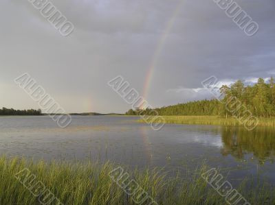 Rainbow over wood lake