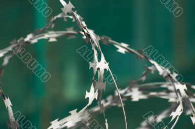 Barbed wire with sharp steel edges