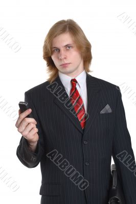 a businessman in a black suit with a telephone