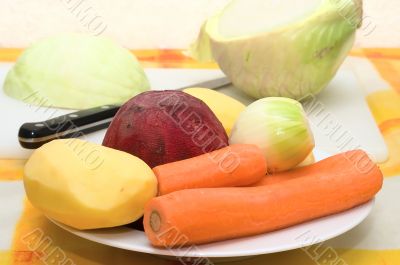 Peeled vegetables on a plate