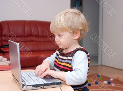 The kid with a notebook in house conditions.