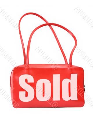 handbag with sold sign
