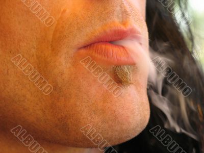 smoke out of man`s mouth