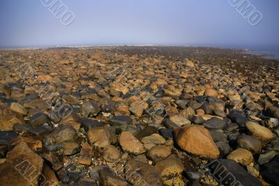 Granite pebbles, rounded by the ocean