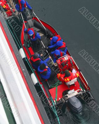 Polar landing boat, tied to side of cruise ship