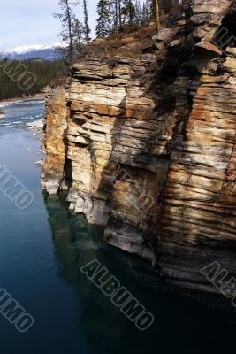 Colorful eroded limestone cliff layers