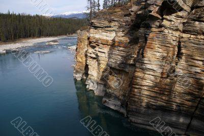 Colorful eroded limestone cliff layers