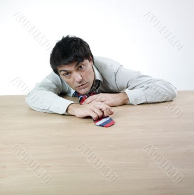 Businessman sleeping on a table