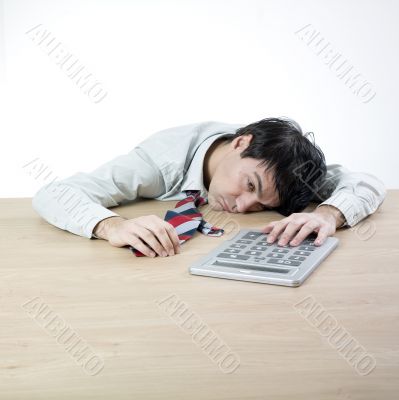 Businessman sleeping on a table