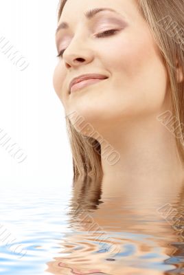 bright picture of smiling woman in water
