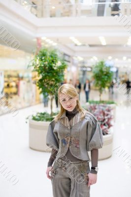 Pretty girl posing in a mall