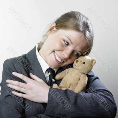 Woman hugging teddy bear