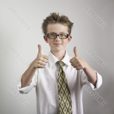 Boy giving two thumbs up