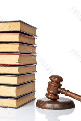 Wooden gavel and old law books