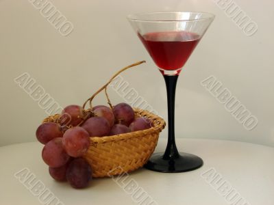 Glass of wine and grapes