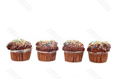 Four tasty muffin with chocolate