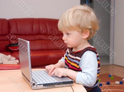 The kid with a notebook in house conditions.