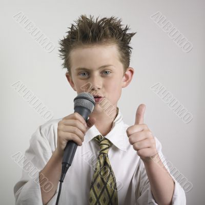 Happy boy with microphone