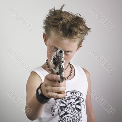 Boy pointing gun