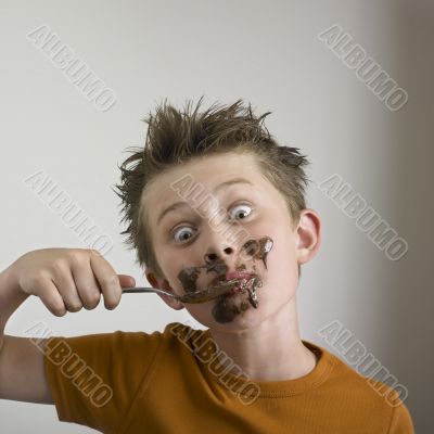Boy and chocolate fudge