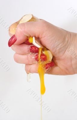 The female hand presses an egg on the night of February, 29th