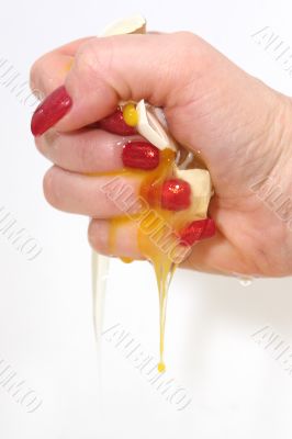 The female hand presses an egg on the night of February, 29th