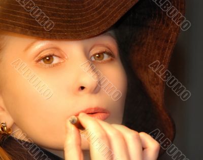 attractive young girl in hat