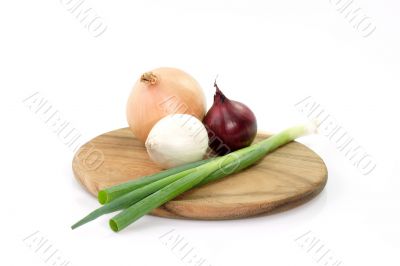 Onions on a wooden board