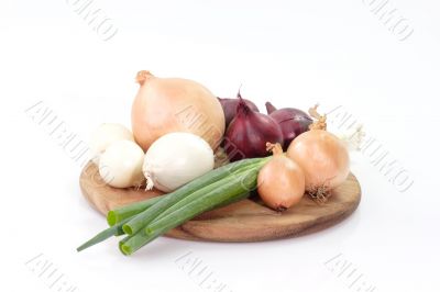 Onions on a kitchen board