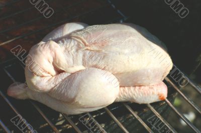 Raw Chicken on a Barbecue