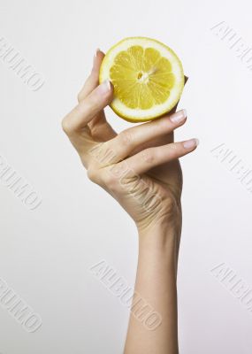 hand holding lemon