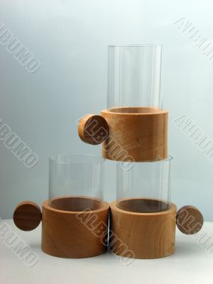Three glass glasses in supports