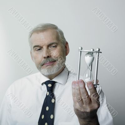 Man holding hourglass