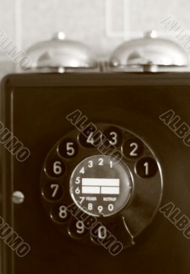 black retro telephone on white
