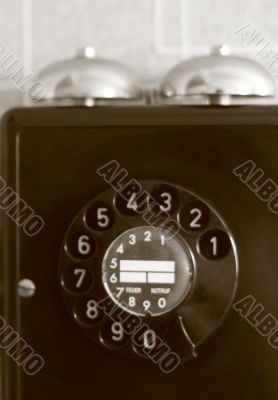 black retro telephone on white