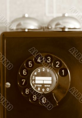 black retro telephone on white