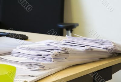 Folders with papers on office desk