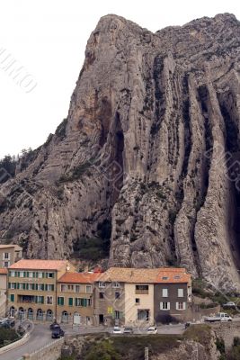 Rocky break above  Sisteron - town