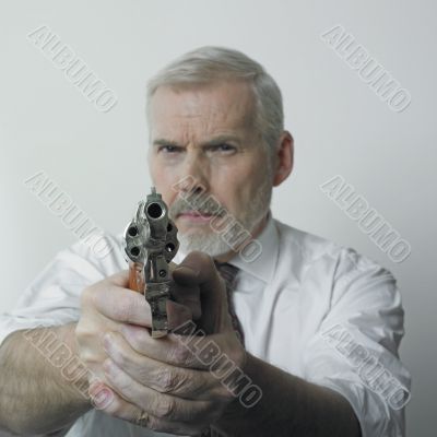 Old man with handgun