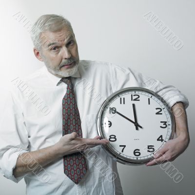 Man holding large clock