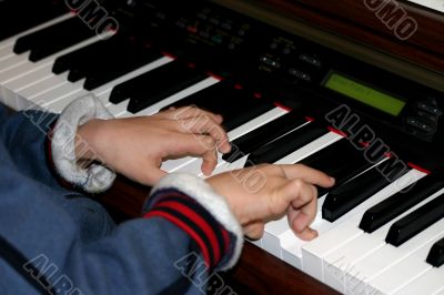 Boy On Piano
