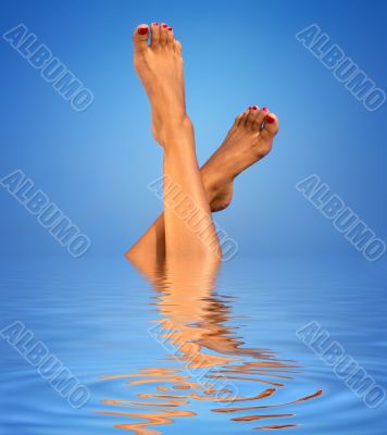 legs in blue water
