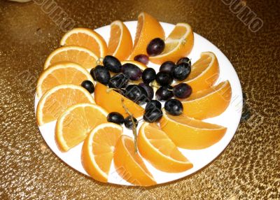 Orange Segments and Black Grapes